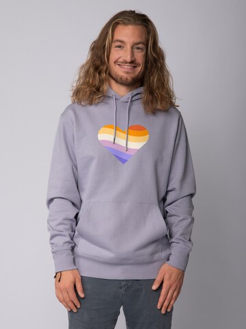 Felpa ' Rainbow Heart ' di Watapparel in lilla: frontale