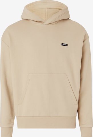 Sweat-shirt Calvin Klein en beige : devant