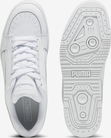 Baskets basses PUMA en blanc