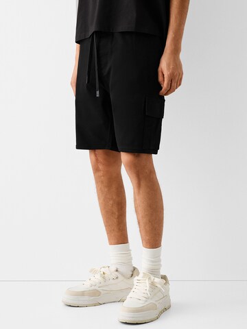 Bershka Loose fit Cargo Pants in Black