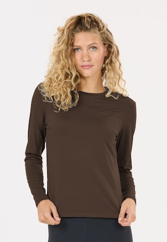 Athlecia Performance shirt 'Almi V2' in Brown: front