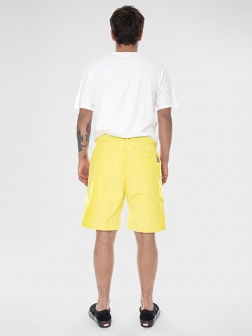 Baggy Pantaloni 'M' Clover Short Limoncello Stone Washed' di Carhartt WIP in giallo