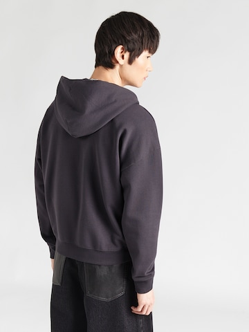 LEVI'S ® Collegetakki värissä musta