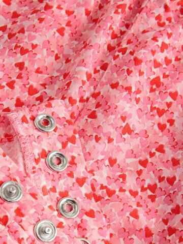 Ensemble Next en rose