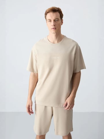 Tuta da jogging di Tommy Life in beige: frontale