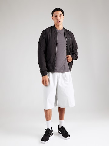 PUMA Paita 'Essentials Elevated' värissä harmaa