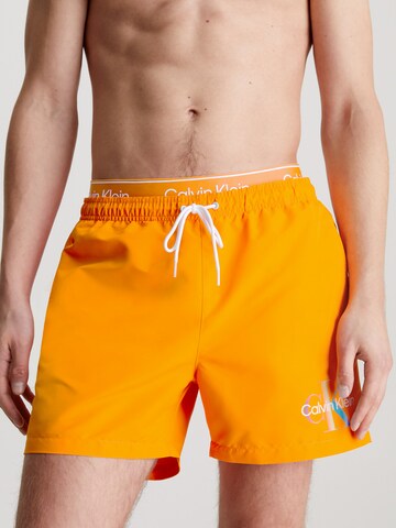 Calvin Klein Swimwear Zwemshorts 'Pride' in Oranje: voorkant