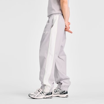 new balance Wide leg Sportbroek 'Trackside Woven Pant' in Grijs