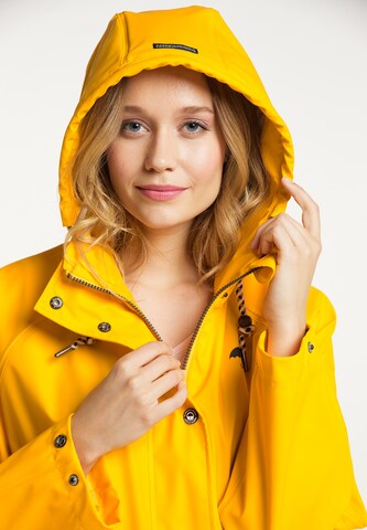 Manteau fonctionnel Schmuddelwedda en jaune