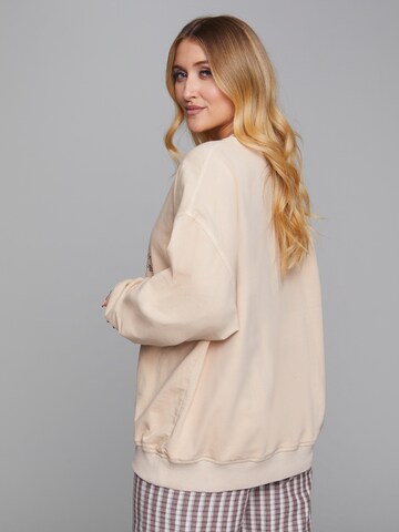 Sweat-shirt 'Franca' ABOUT YOU x Sharlota en beige