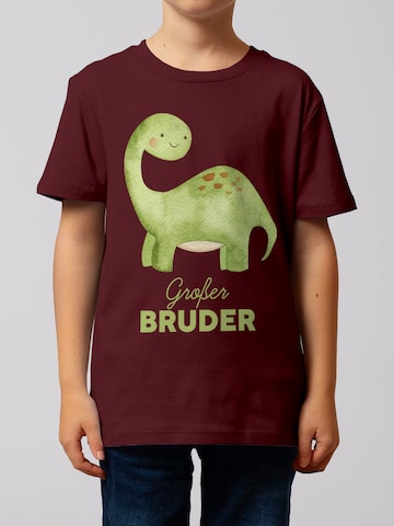 Maglietta 'Dinosaurier Großer Bruder' di watabout.kids in rosso