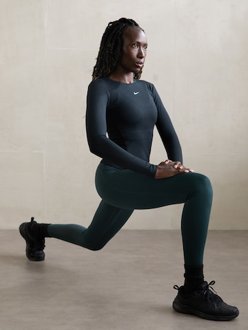 NIKE Funktionsbluse 'ONE' i sort