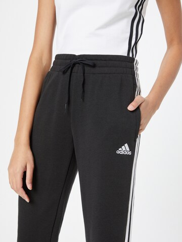 ADIDAS SPORTSWEAR Дънки Tapered Leg Спортен панталон 'Essentials Studio Lounge Cuffed 3-Stripes' в черно