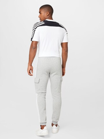 ADIDAS ORIGINALSTapered Cargo hlače 'Adicolor 3-Stripes ' - siva boja