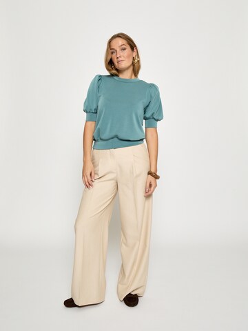 Top 'Livna' di minus in verde