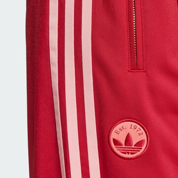 ADIDAS ORIGINALS Loose fit Trousers 'Firebird' in Red
