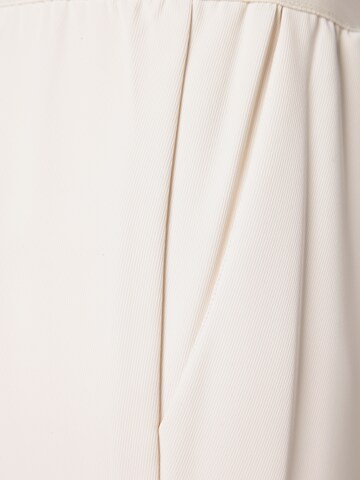 Marie Lund Flared Pleat-front trousers in Beige