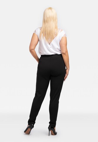 Coupe slim Pantalon à pince 'ERYKA' Karko en noir