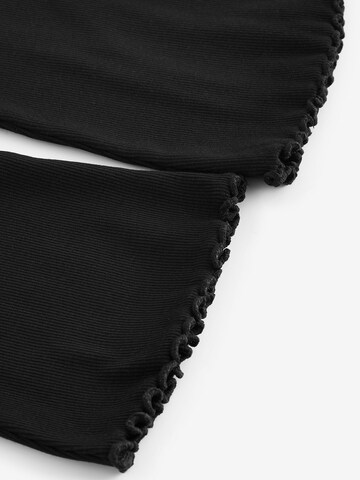 Flared Leggings di Next in nero