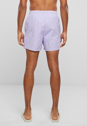 Karl Kani Badeshorts in Lila