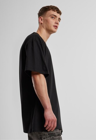 Karl Kani T-Shirt in Schwarz