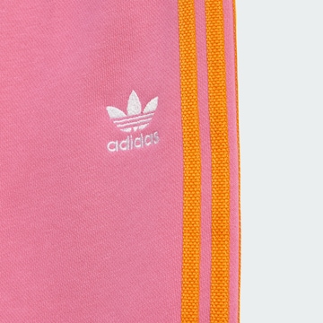 ADIDAS ORIGINALS Joggingpak in Oranje