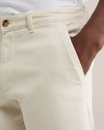 WE Fashion Свободный крой Брюки-чинос в Бежевый