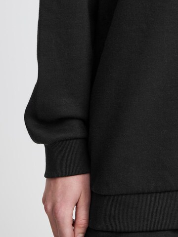 Oxmo Sweatshirt in Zwart