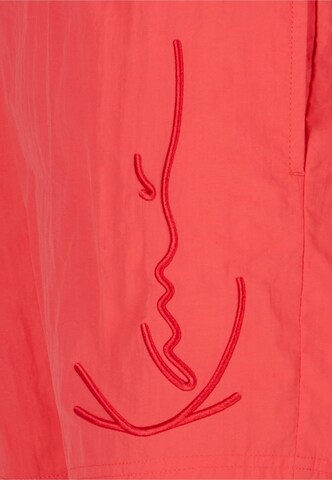 regular Pantaloni di Karl Kani in rosso