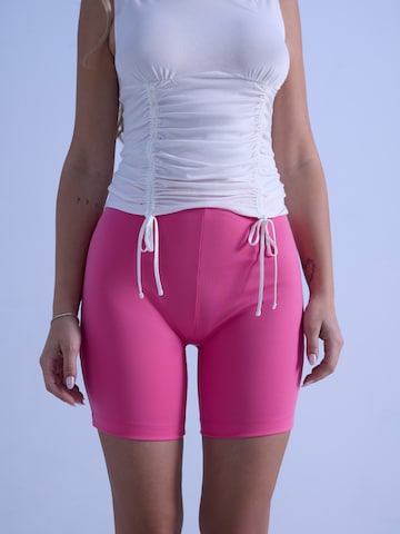 ABOUT YOU x irinassw Slim fit Leggings 'Nala' in Pink: front