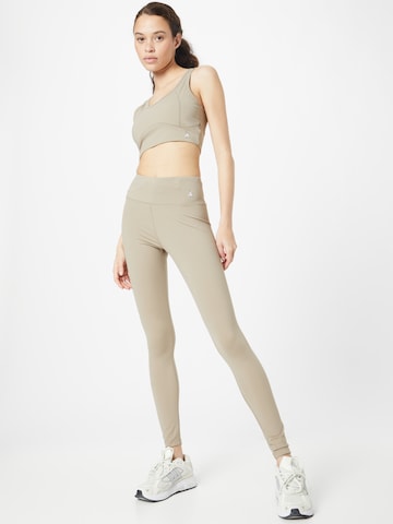 Juicy Couture Sport Skinny Spodnie sportowe 'LORRAINE' w kolorze beżowy