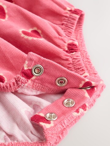 Next - Pijama entero/body en rosa