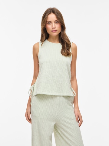 Haut VILA en vert : devant