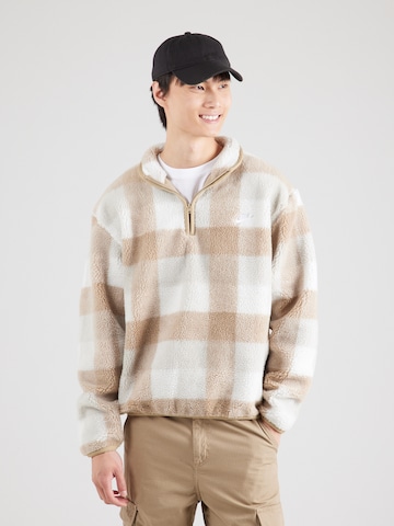 Sweat-shirt 'Club' Nike Sportswear en beige : devant