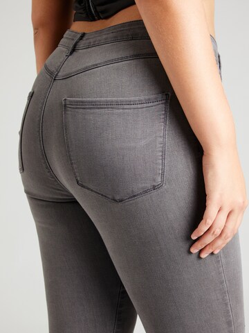 Skinny Jeans 'CARTHUNDER' di ONLY Carmakoma in grigio