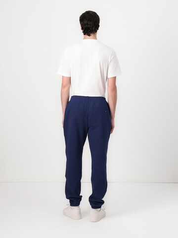 TOMMY HILFIGER Tapered Nadrág - kék: hátul