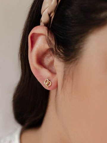 Hey Happiness - Pendientes 'Pretzel Delight' en oro