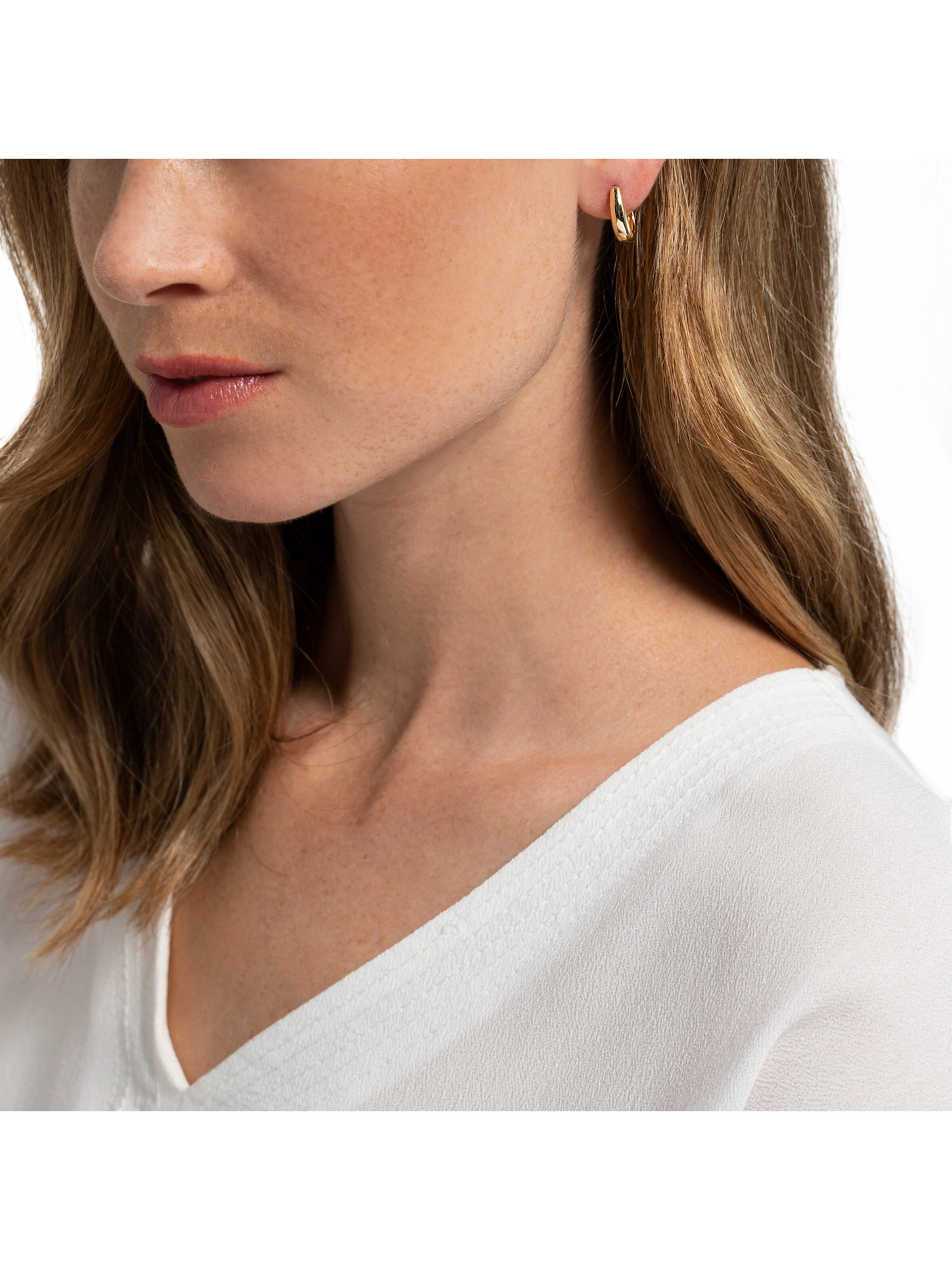 CHRIST Ohrring in Gelb: Vorderseite