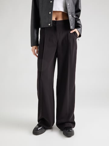 Calvin Klein Regular Trousers with creases in Black: front