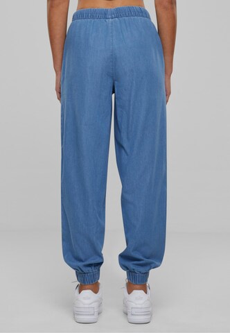 Tapered Jeans di Urban Classics in blu