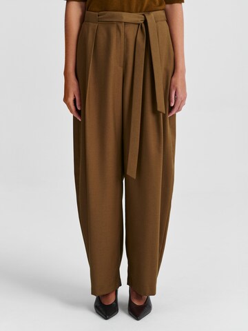 Wide leg Pantaloni con pieghe 'Anaiso' di TATUUM in verde: frontale