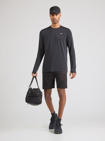 Reebok Koszulka funkcyjna w kolorze czarny