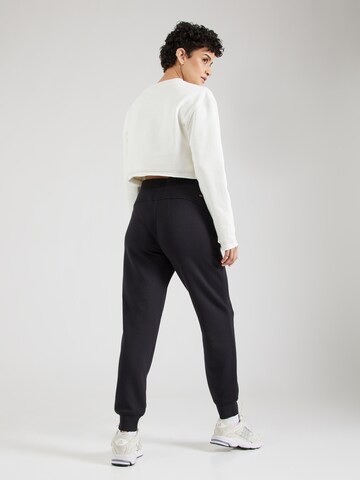 Effilé Pantalon 'Luxe' SKECHERS en noir