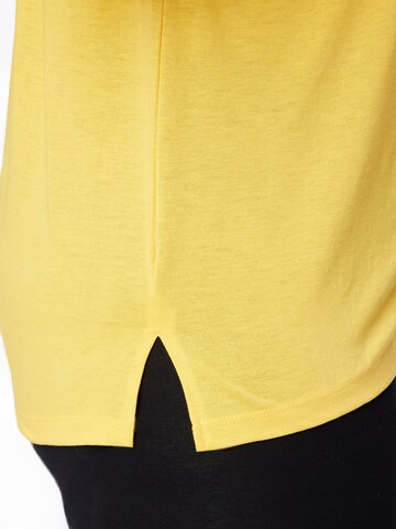 Only Play Curvy - Camiseta funcional en amarillo