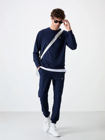 Survêtement Tommy Life en bleu : devant