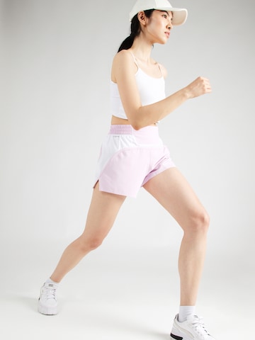 PUMA Normalny krój Spodnie sportowe 'RUN ULTRAWEAVE VELOCITY 4' w kolorze różowy