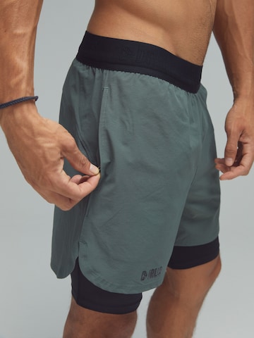 DRILLS Apparel Regular Sportbroek 'RECREATION 2-in-1 Shorts' in Groen