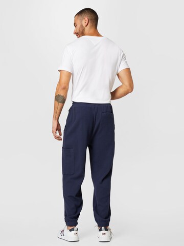 Tapered Pantaloni de la Tommy Jeans pe albastru