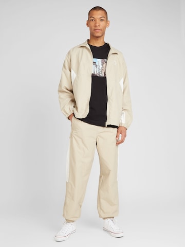 CONVERSE Tapered Trousers 'STARSPRINTER' in Beige