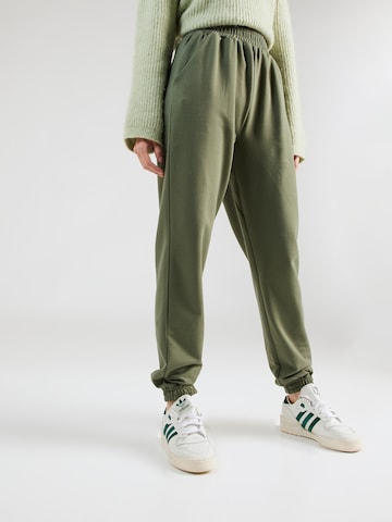 ABOUT YOU Tapered Trousers 'Naomi' in Green: front